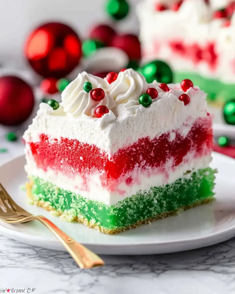 A vibrant layered dessert features green, red, and white sections topped with festive sprinkles and whipped cream, set against a backdrop of holiday decorations.