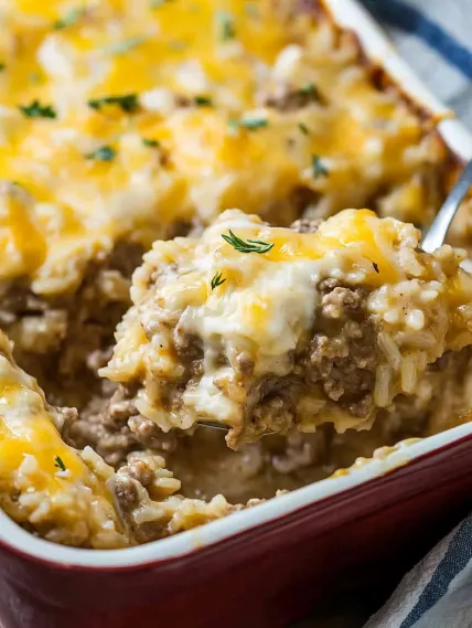 A dish of food with a fork in it.