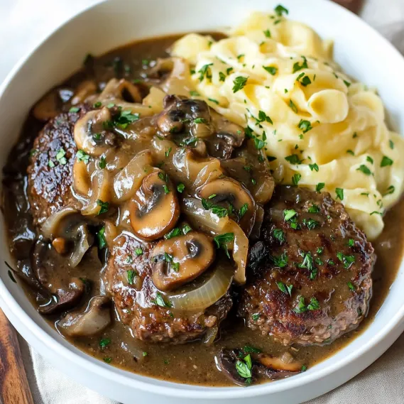 A bowl of food with mushrooms and noodles.