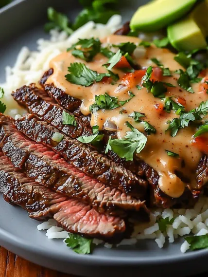 A plate of food with rice and meat.