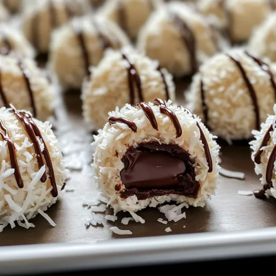 A plate of chocolate covered marshmallows.