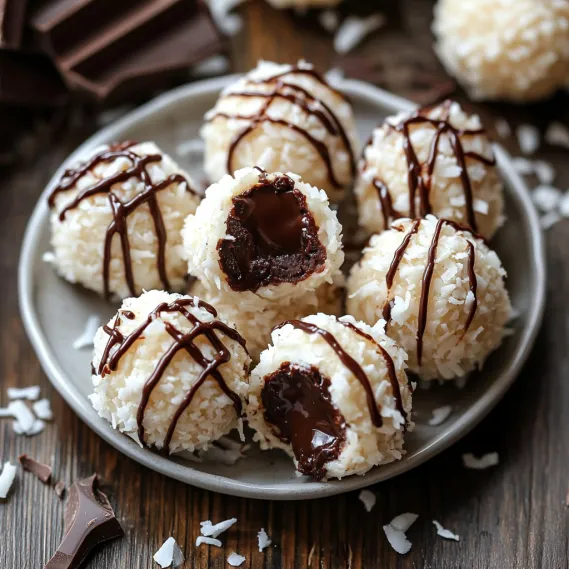 A plate of chocolate covered marshmallows.