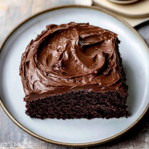 A chocolate cake on a plate.