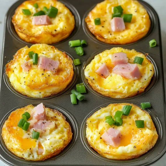 A tray of ham and cheese muffins.