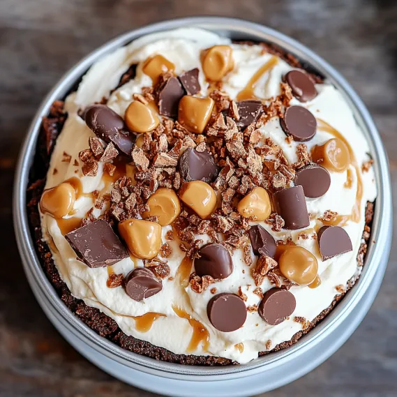 A dessert with chocolate and peanut butter toppings.