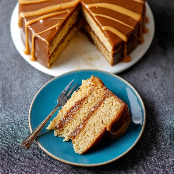 A slice of cake on a plate.