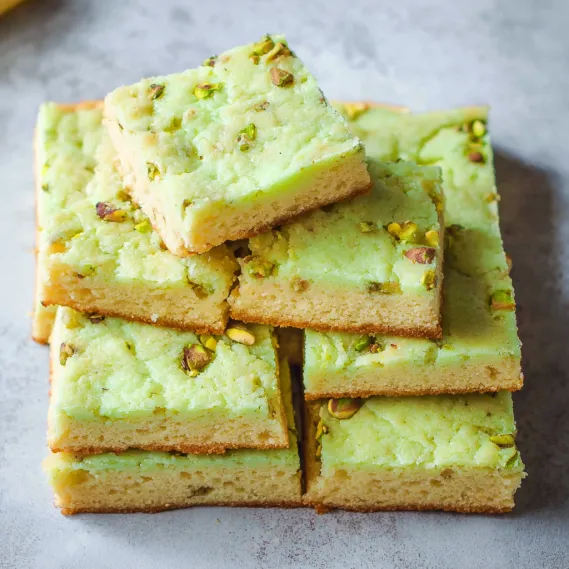 A stack of green cake squares.