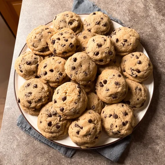 A plate of chocolate chip cookies.