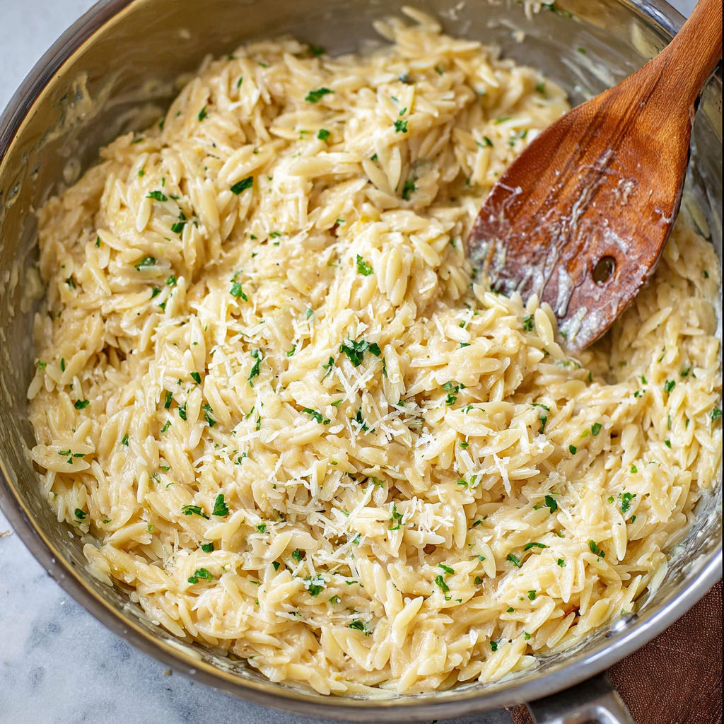 A bowl of creamy garlic Parmesan orzo.