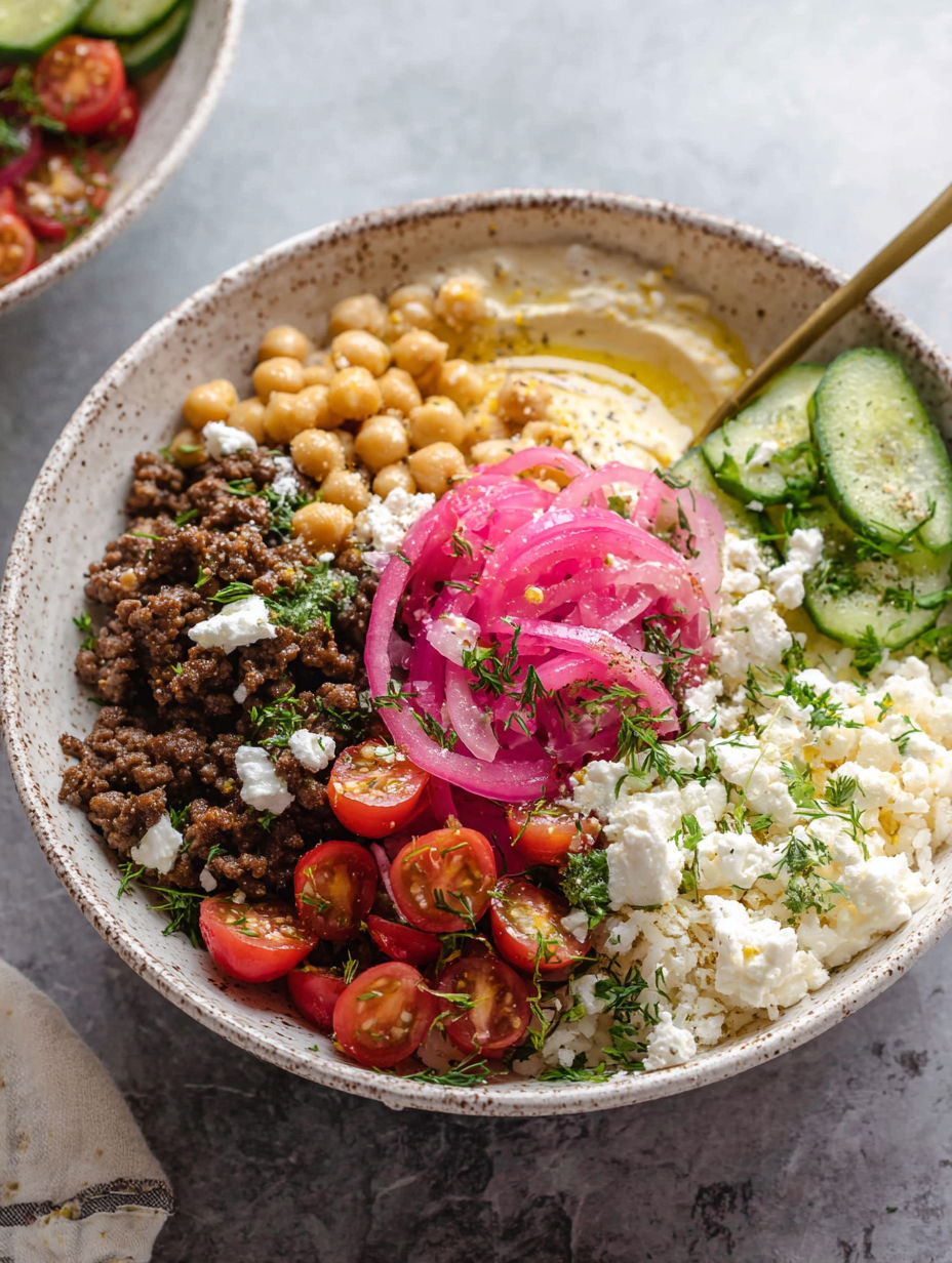 A bowl of food with a fork in it.