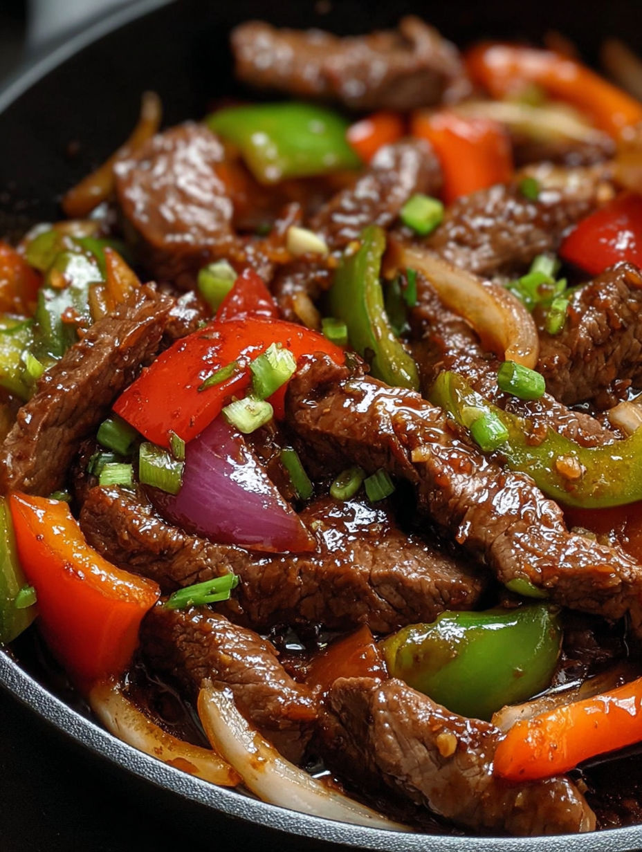 A stir fry of beef and peppers.