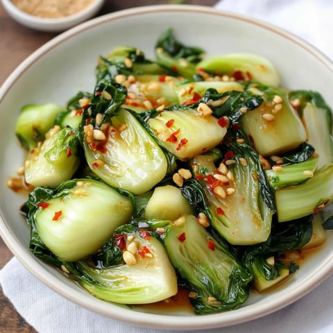 A bowl of vegetables, including broccoli, is placed on a table.