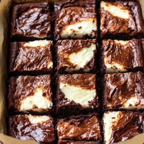 A square of chocolate and white cake.